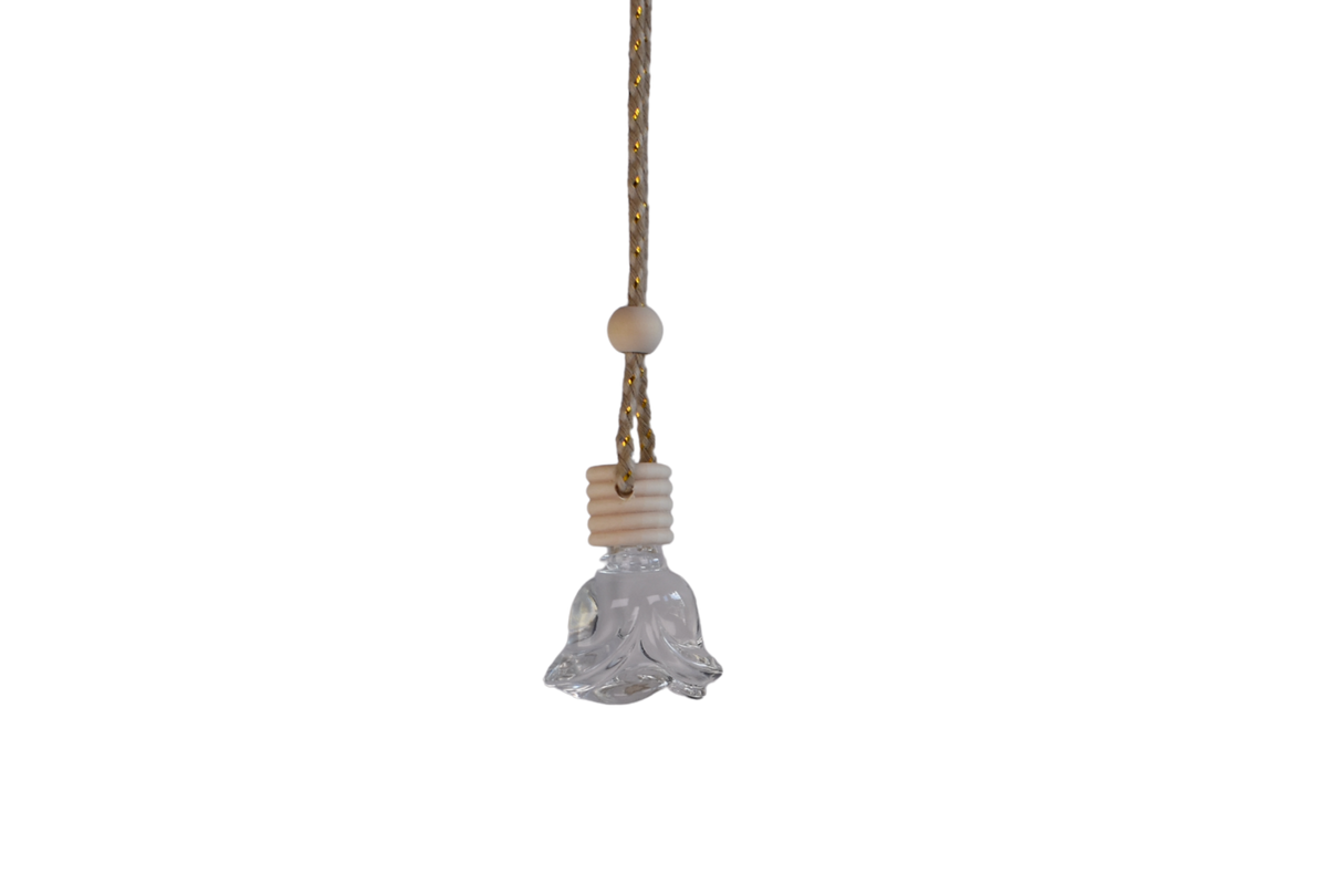 A hanging decorative rose glass bottle car air freshener with a clear textured glass body, a beige wooden bead, and a beige ribbed collar, suspended from a braided cord on a plain white background.