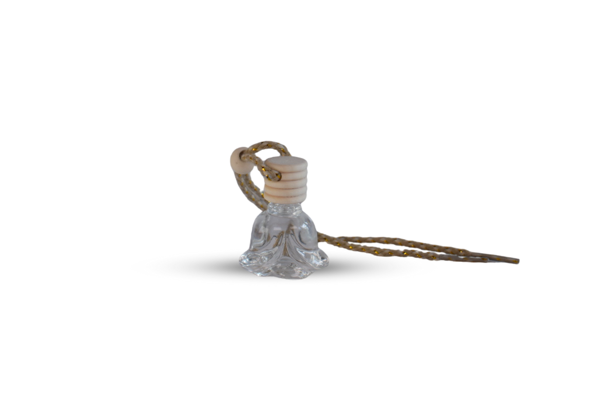 A small clear glass rose shaped air freshener bottle with a cream-colored wooden stopper and a gold chain, shown on a plain white background.